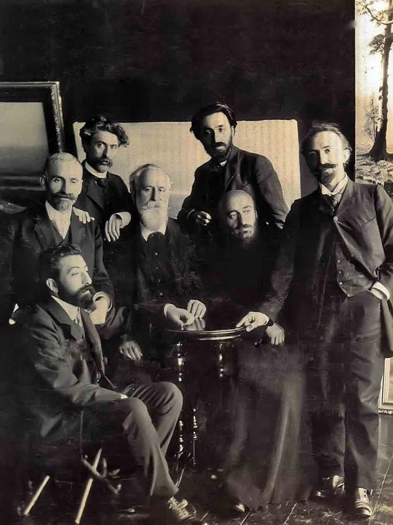 Photo: From left to right — Avetik Isahakyan, Hovhannes Tumanyan, Gevorg Bashinjaghian, Ghazaros Aghayan, Vardanes Papazian, Komitas, Arshak Chobanyan. The literary club “Vernatun.” Tbilisi, 1908. Image